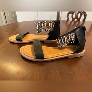Sandals with multi-colored beads around ankle with heel zipper
